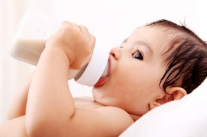 <img src="cute baby drinking bottle" alt="cute baby holding and drinking from a bottle">
